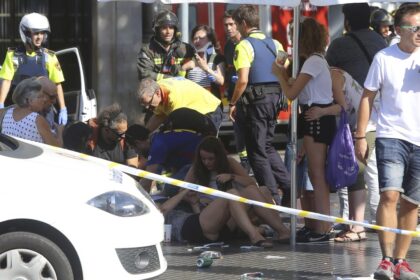 Attacker drives van into Barcelona crowd killing 12 and injuring 80