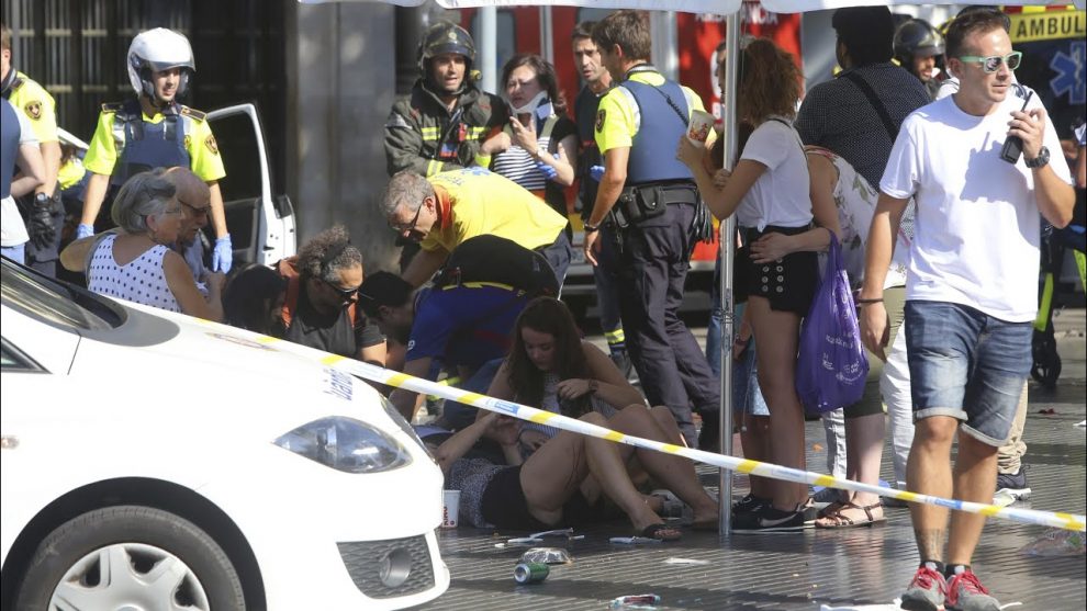 Attacker drives van into Barcelona crowd killing 12 and injuring 80